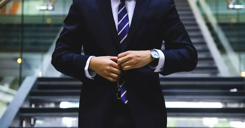 Stylized workplace photography for AML Analyst mock interview context on MockitX (theme-matched Unsplash source)