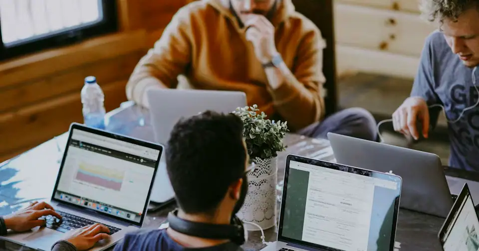 Stylized workplace photography for Compliance Manager mock interview context on MockitX (theme-matched Unsplash source)