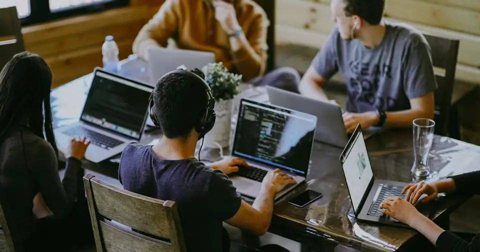Stylized workplace photography for Cost Accountant mock interview context on MockitX (theme-matched Unsplash source)