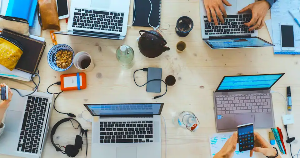 Stylized workplace photography for NGO Program Manager mock interview context on MockitX (theme-matched Unsplash source)