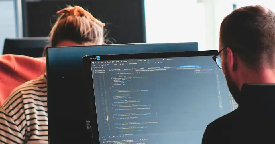 Stylized workplace photography for PostgreSQL DBA mock interview context on MockitX (theme-matched Unsplash source)