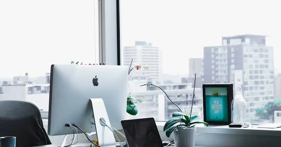Stylized workplace photography for Retail Buyer mock interview context on MockitX (theme-matched Unsplash source)